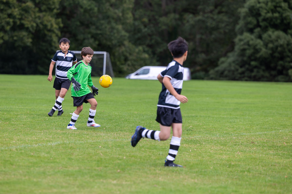 Horris Hill pupils playing football on the school pitches